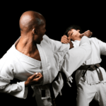 Two karateka in the middle of a karate fight
