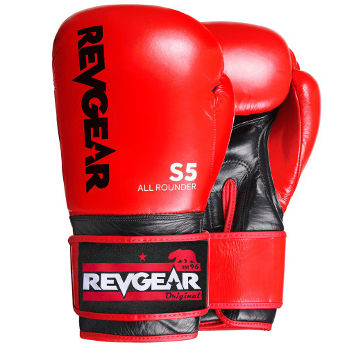 Revgear boxing gloves review of high-quality Revgear boxing gloves designed for martial artists. These gloves feature a secure wrist support and a grip bar for a tight fist. Made with premium leather and equipped with shock absorption, they ensure great protection during training sessions